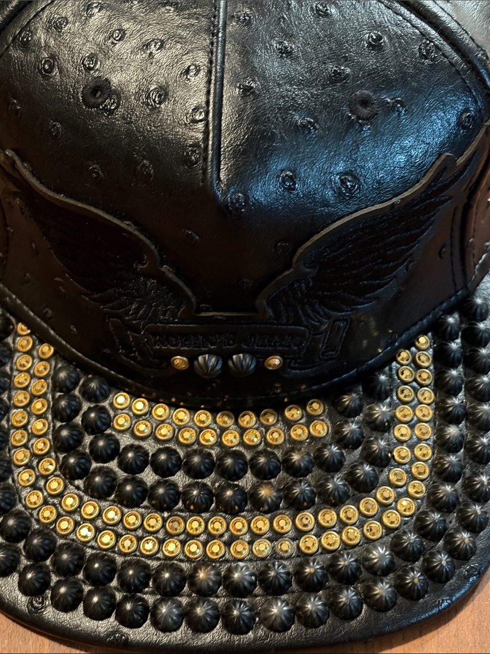 Robin's Jean Black Leather Cap with Gold Stud Embellishments
